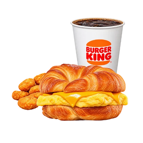 Egg cheese Croissan'wich meal with hash browns and coffee - buttery croissant breakfast combo